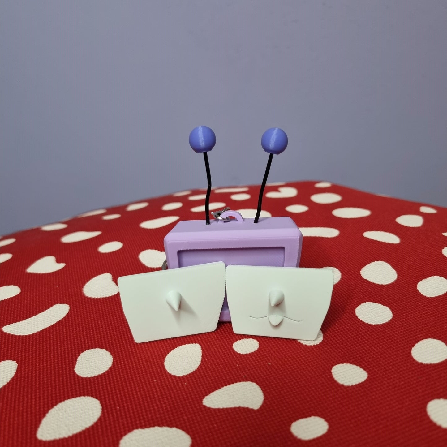 Tenna inspired keychain with swappable face