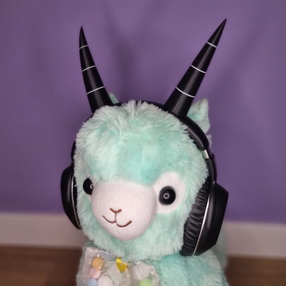 Headset accessory: 3d printed imp horns (black with white lines)