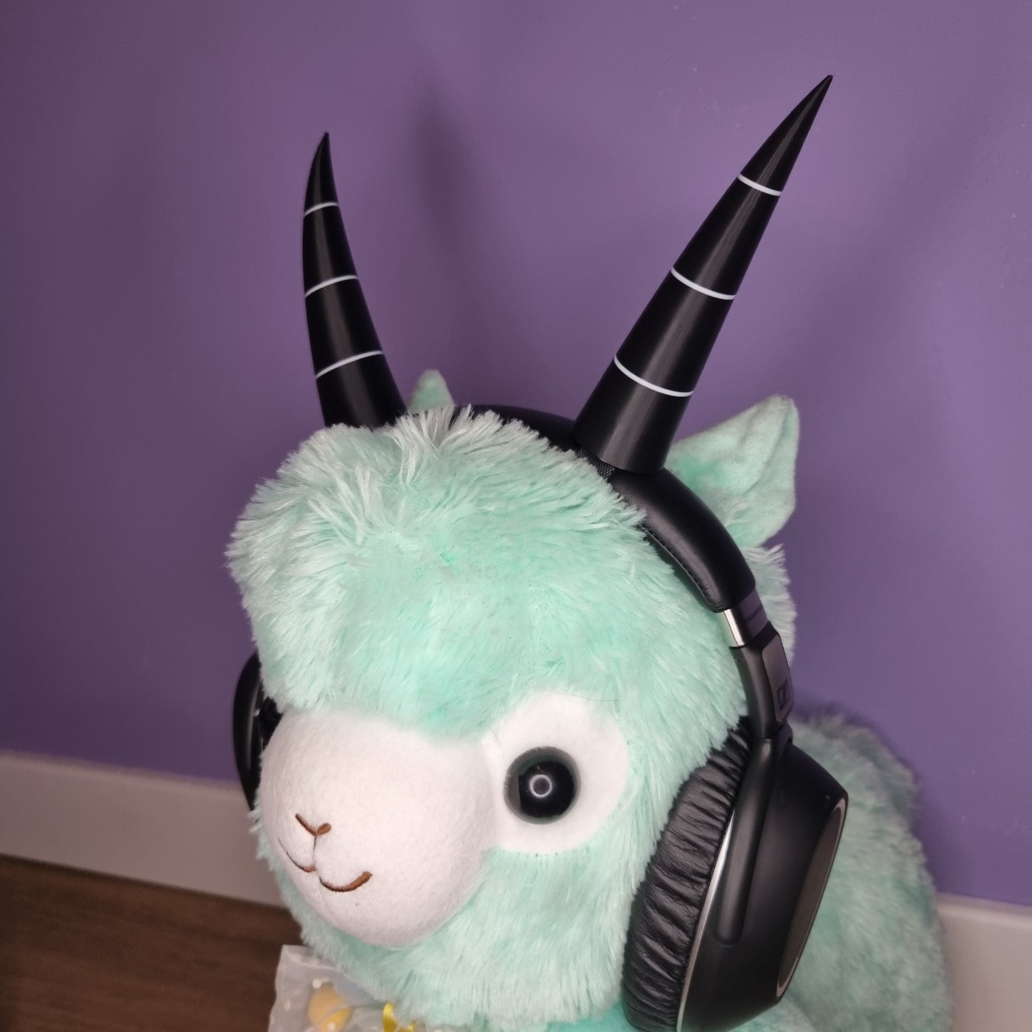 Headset accessory: 3d printed imp horns (black with white lines)