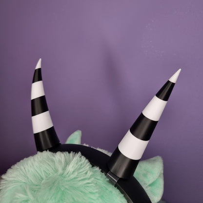 Headset accessory: 3d printed imp horns (black & white stripes)