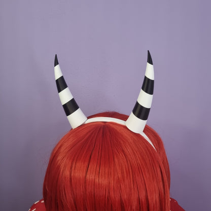 Pair of inwards imp horns (black & white stripes)