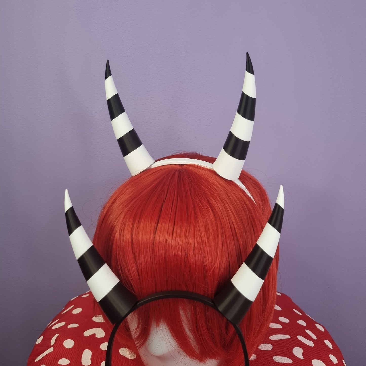 Pair of inwards imp horns (black & white stripes)