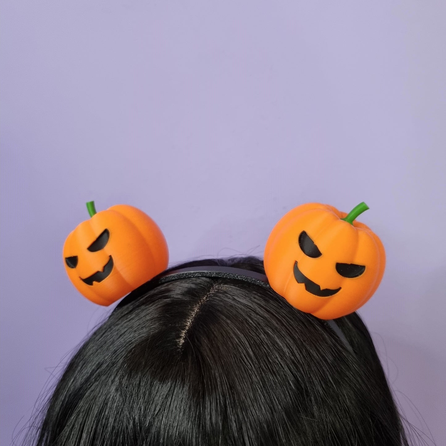 Pair of halloween pumpkins on headband