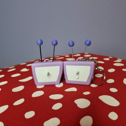 Tenna inspired keychain with swappable face