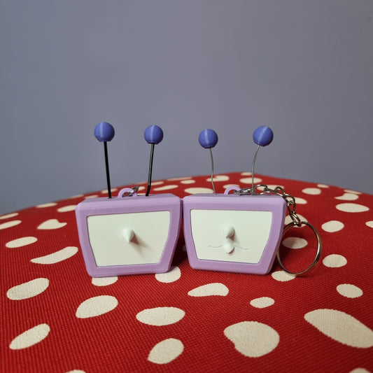 Tenna inspired keychain with swappable face