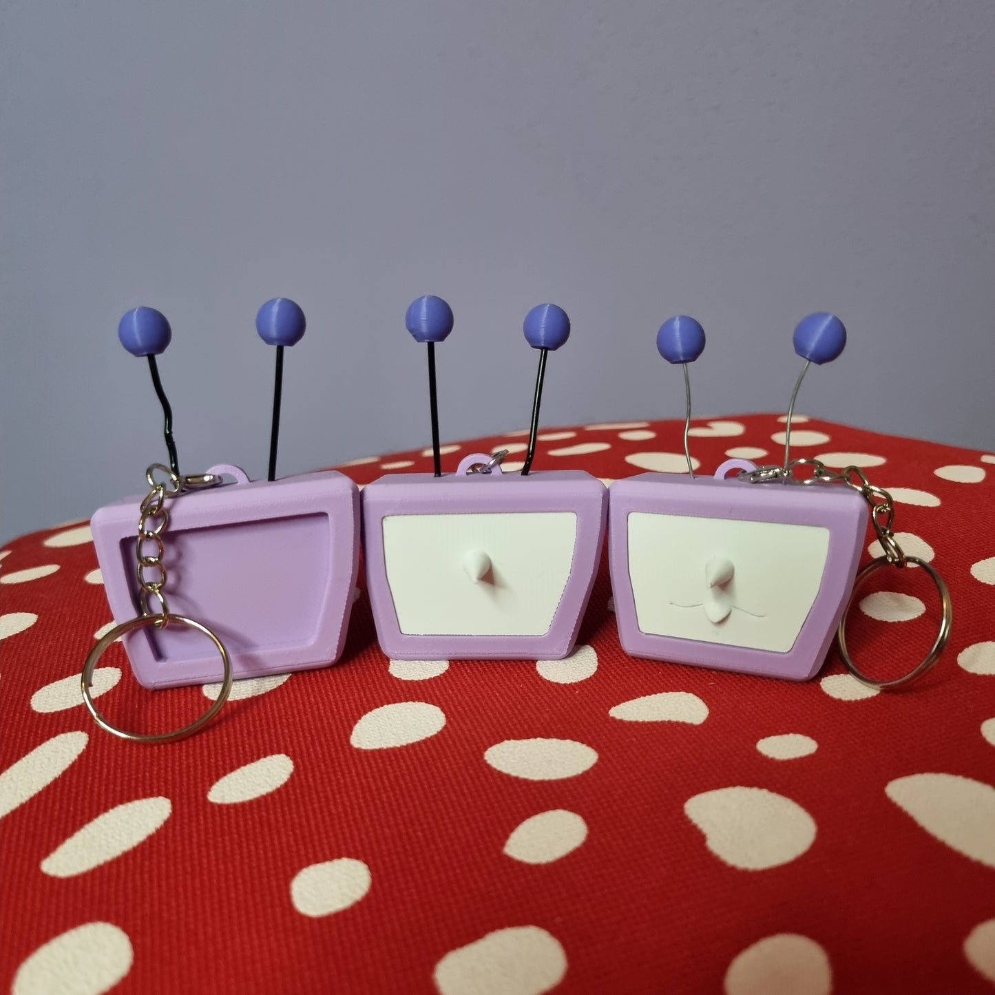 Tenna inspired keychain with swappable face