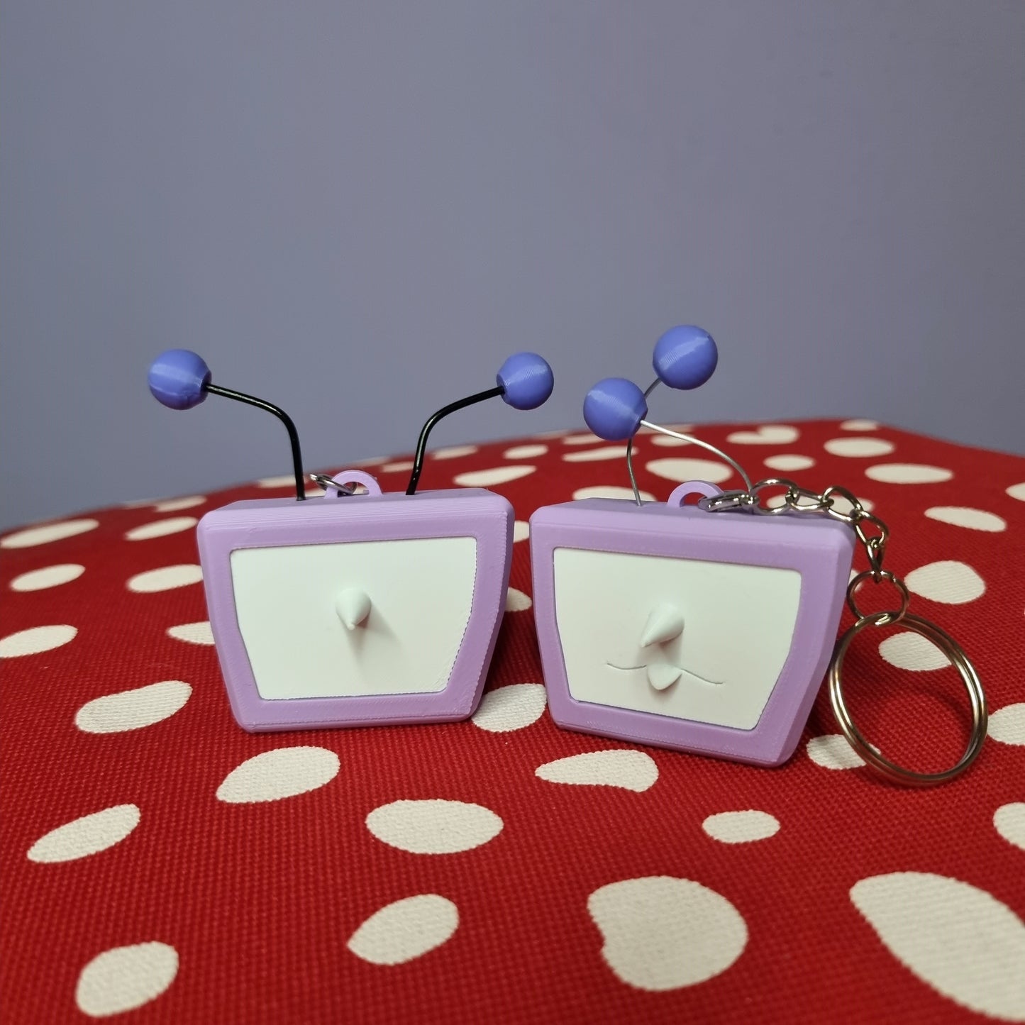 Tenna inspired keychain with swappable face