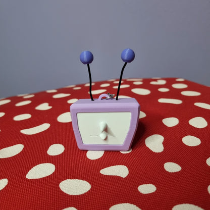 Tenna inspired keychain with swappable face