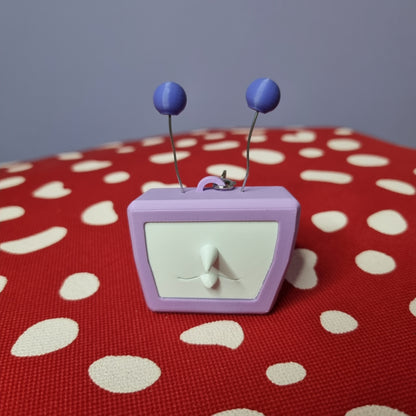 Tenna inspired keychain with swappable face