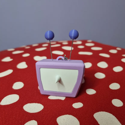 Tenna inspired keychain with swappable face