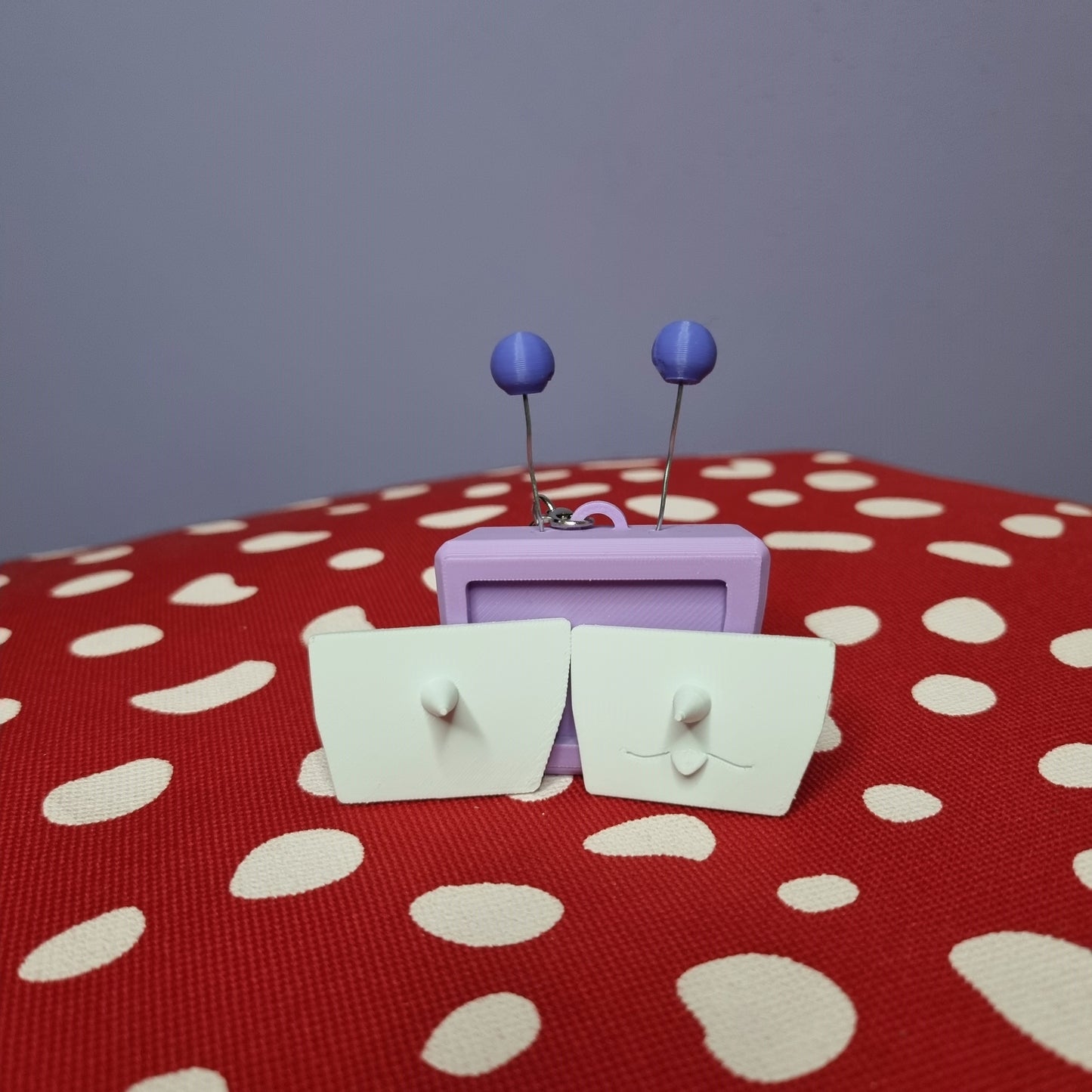 Tenna inspired keychain with swappable face