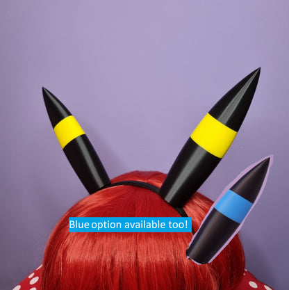 Pokemon Umbreon inspired cosplay ears on a headband, both regular and shiny versions