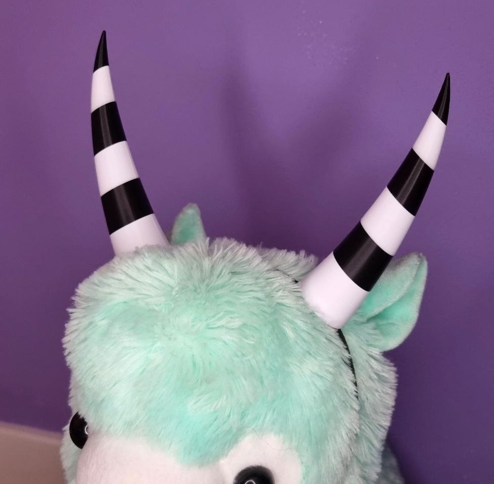 Pair of inwards imp horns (black & white stripes)