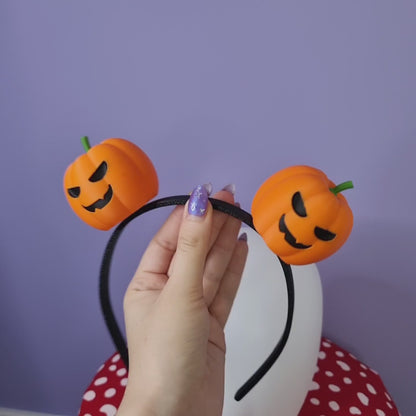 Pair of halloween pumpkins on headband